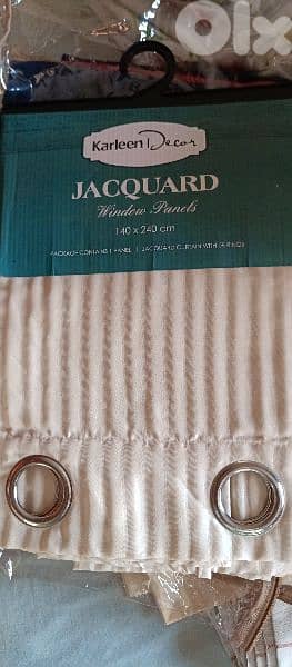 two curtains light beige color. 140x240 cm with 8 silver rings each 0