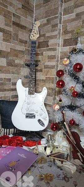 electric guitar with bag and cable and picks free 3