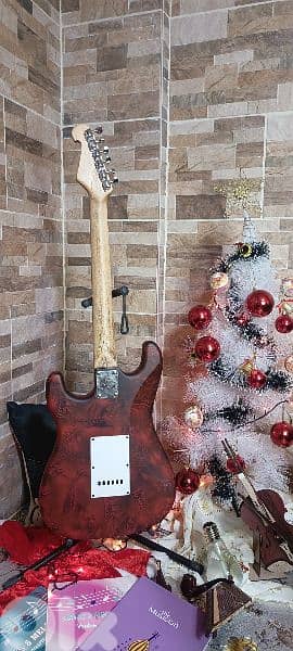 electric guitar with bag and cable and picks free 5