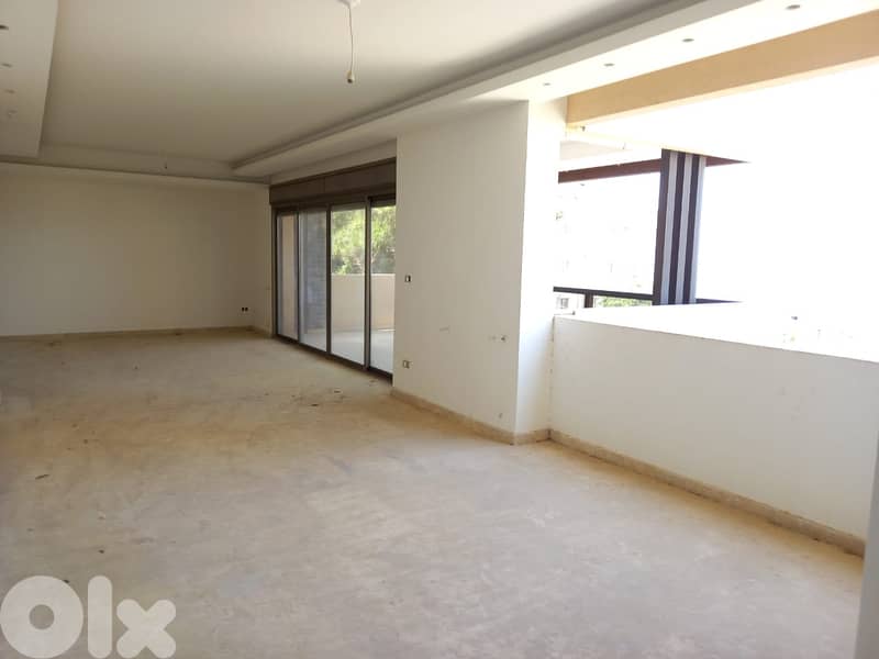 L08162 - Apartment for Sale in Haret Sakher with a Small Terrace 0