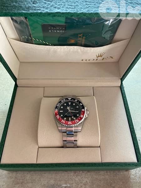 Rolex GMT-Master II “Coke” 1