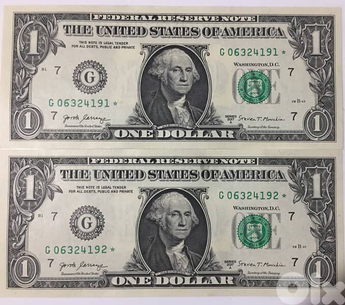 ورقتان فئة دولار غير مستعملين عليهم نجمة ارقام متسلسلة 0