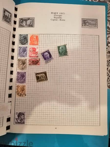 Explorer 200 old world stamps in album 7