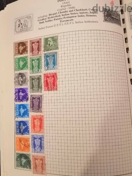 Explorer 200 old world stamps in album 8