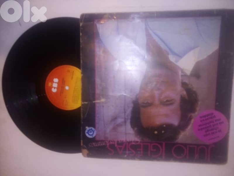 2 Julio vinyl albums  both 12$ 1