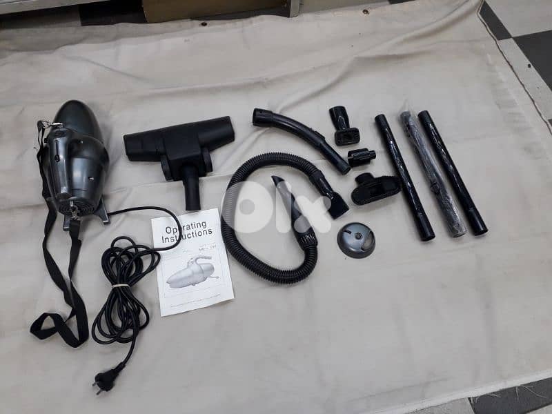 مكنسة كهربائية صغيرة الحجم 1