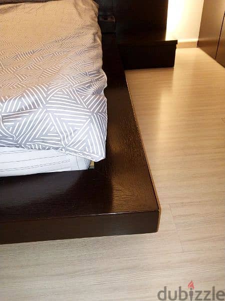 bedroom with bed side table and dressing table with mirror 3