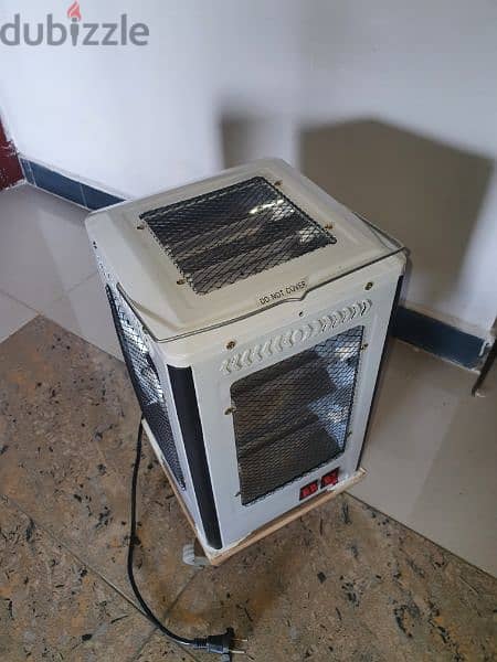دفاية كهرباء جديدة مع علبة2000watts 1