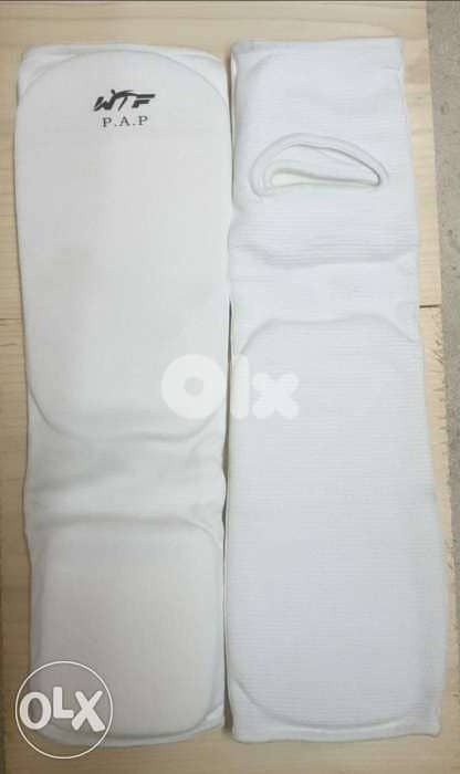 Martial arts foot protector with instep textile 0