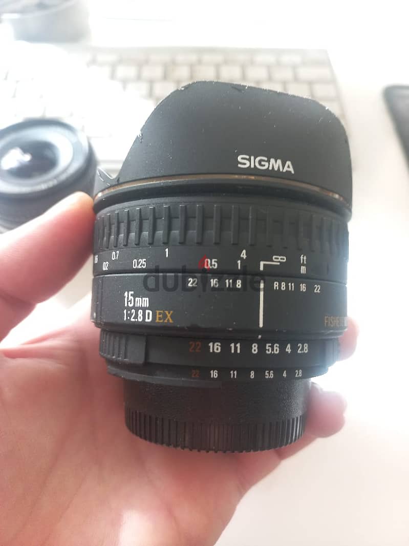2 Nikon SLR  Lenses - 2 Panasonic i think G40 Lenses 4