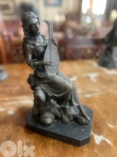bronze piece girl with musical instrument 0
