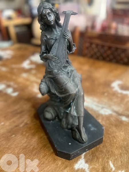 bronze piece girl with musical instrument 2