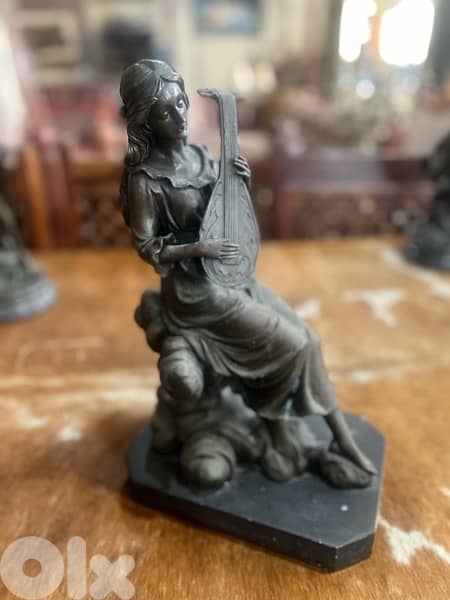 bronze piece girl with musical instrument 3