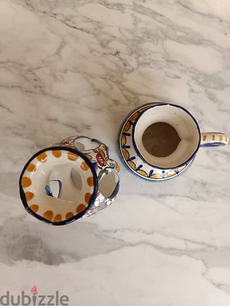 A ceramic hand painted candle holder 2