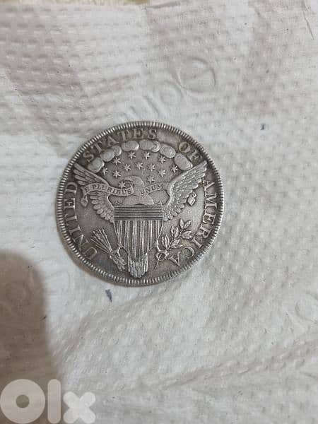 A silver old coin 7 dollars the gram 11