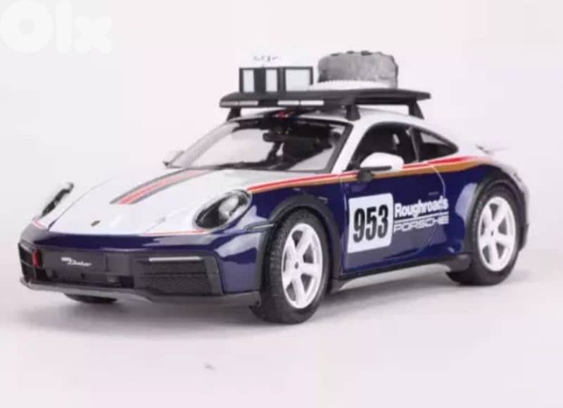 Porsche 911(992) Dakar diecast car model 1:24. 1