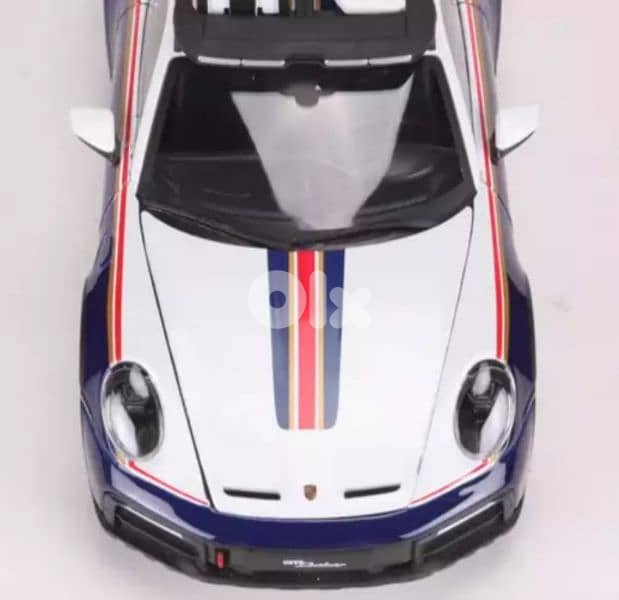 Porsche 911(992) Dakar diecast car model 1:24. 4