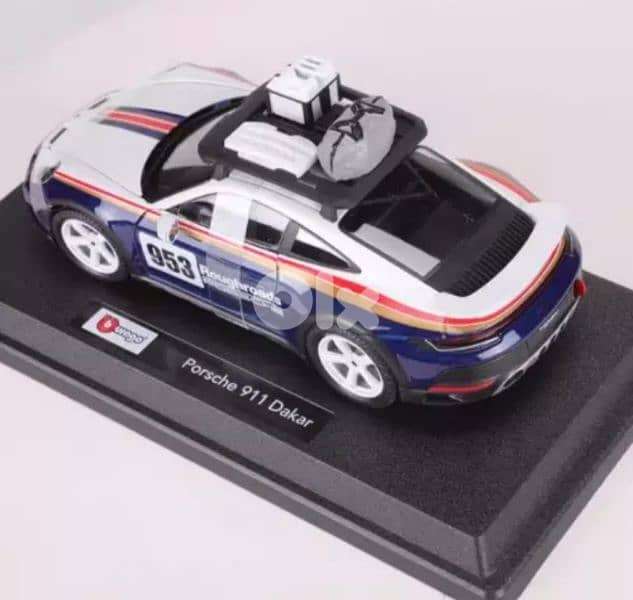 Porsche 911(992) Dakar diecast car model 1:24. 10