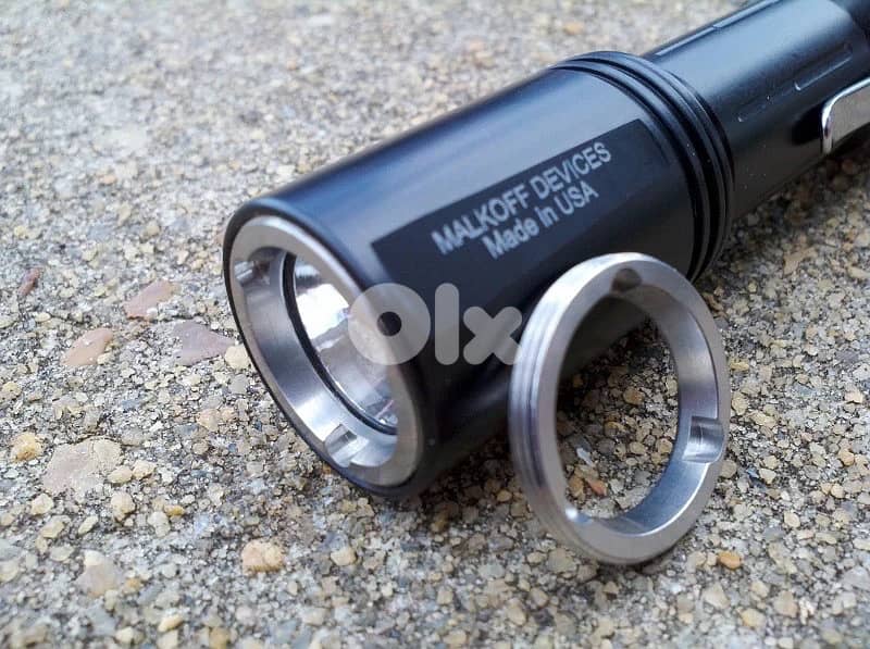 Malkoff Bodyguard Flashlight + Xtar X2 Li-ion Charger + SS Bezel Ring 6