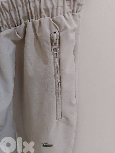 بنطلون رجالي قماش بعدو جديد ماركة LACOSTE قياس XL السعر 15$ 3