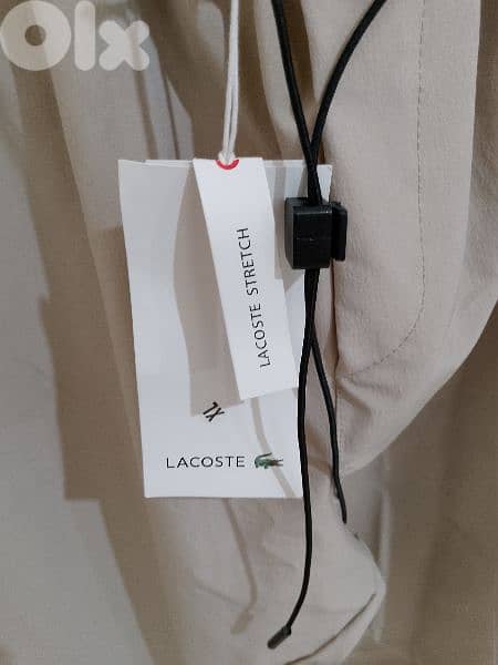 بنطلون رجالي قماش بعدو جديد ماركة LACOSTE قياس XL السعر 15$ 5