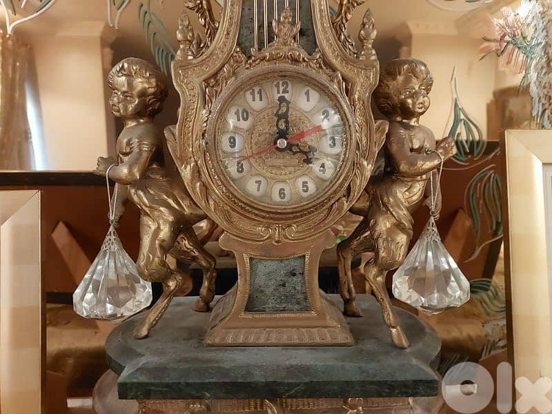 ساعة و شمعدانين Clock and 2 Candlesticks 7