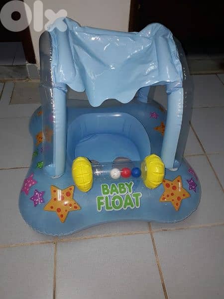 5 items:2 Intex baby floats +baby neck ring +float ring +boat mcqueen 7
