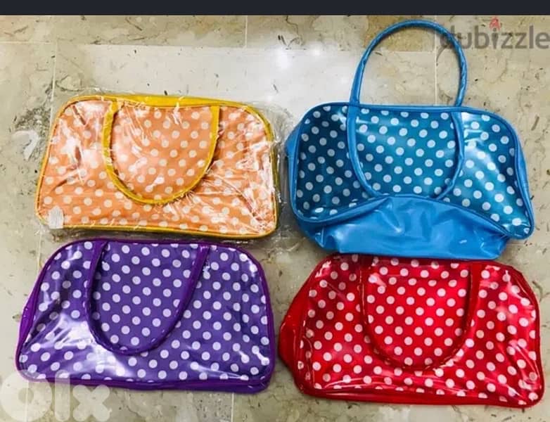 Four colourfull handbags. . . Selling all together 0