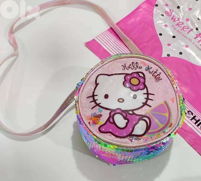 شنطة صغيرة الوان و رسمات متعددة 3