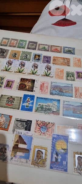 2 big albums are very old stamps  from around the worldgood collection 11