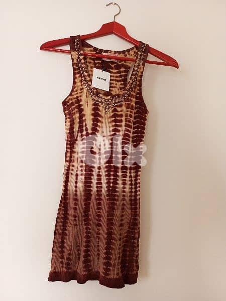 بلوز و تنانير ماركات عدة قياسات مختلفة 6