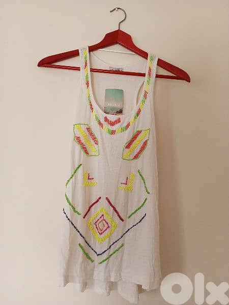 بلوز و تنانير ماركات عدة قياسات مختلفة 12