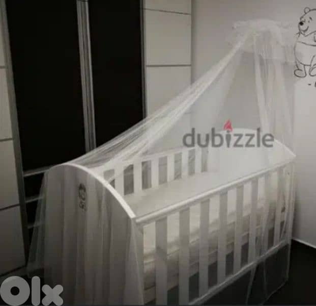 Wooden baby crib + Wooden Extension 220$ both 1