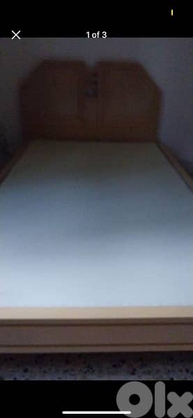 2 wooden beds with mattresses 2