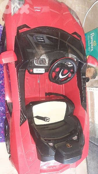 Electric kids car red very good condition 0