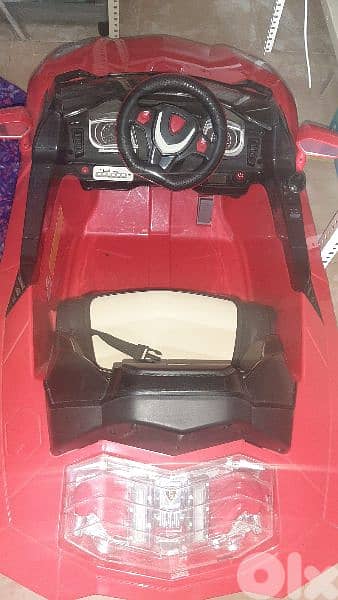 Electric kids car red very good condition 2