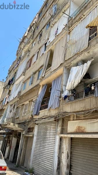 3 buildings that include 41 apartments for sale and 10 shops