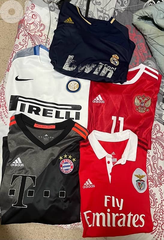 five jerseys : inter, real , bayern , benfica , russia all for 10 usd 0