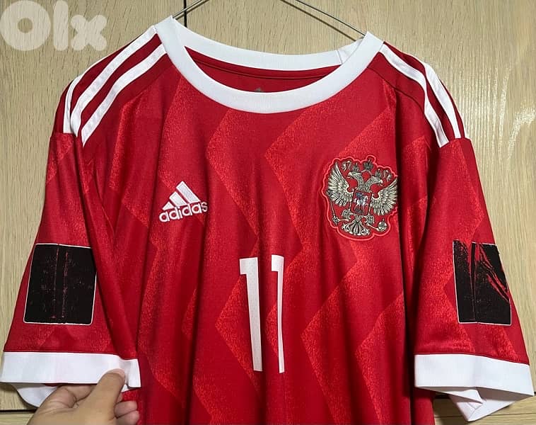 five jerseys : inter, real , bayern , benfica , russia all for 10 usd 7