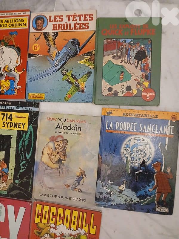 14 livres bandes dessinees en francais, tintin, asterix, quick, chick 4