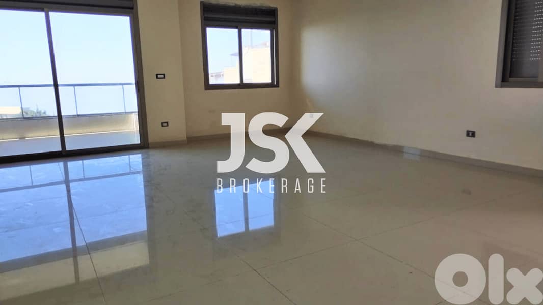 L16382-Bright Apartment For Sale in Ballouneh 0