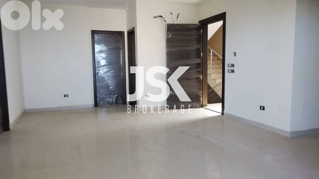 L16384-Apartment With a Garden For Sale in Ballouneh 0