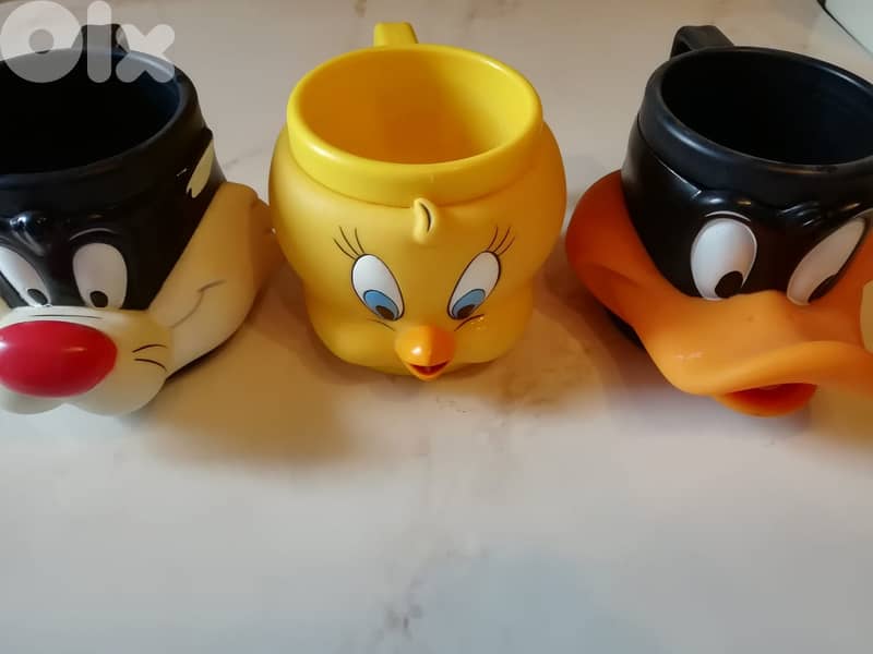 Warner brothers 1992 Looney tunes hard plastic mugs Daffy Tweety & si 0