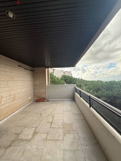 Spacious apartment for rent in Dik el Mehdi with open views.