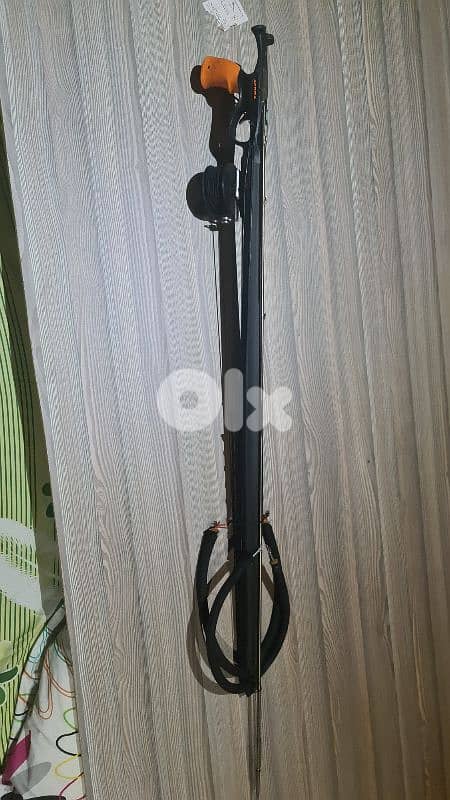 diving suit and speargun 0