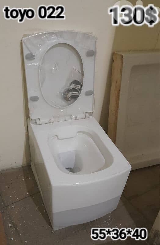 كرسي تعليق  اببض/أسود/رمادي . white/black/grey wall hung toilet seats 3