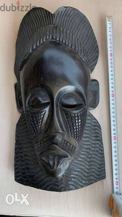 Ebony wood . handmade African mask 1