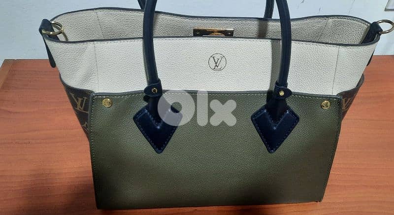 Handbag sac Louis Vuitton. جزدان 1
