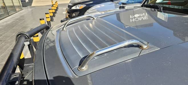 Hummer H3/ H3T Hood handles with grill