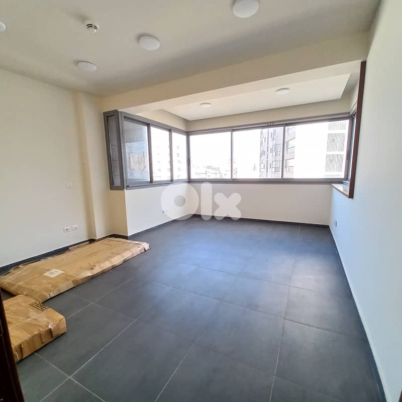 Office in commercial center in Jal el Dib for saleمكتب في المركز التجا 0